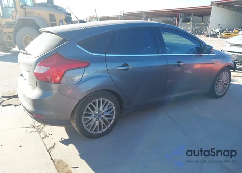 2013 Ford Focus Titanium z USA, uszkodzony, nr VIN 1FADP3N20DL277007